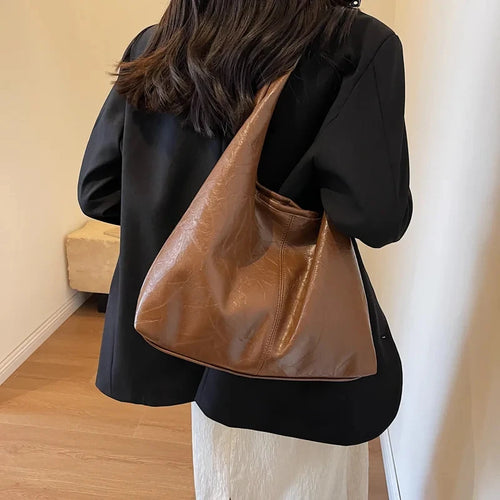 Olivia – Le sac suédine élégant et intemporel