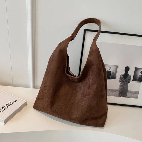 Olivia – Le sac suédine élégant et intemporel