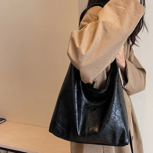 Olivia – Le sac suédine élégant et intemporel