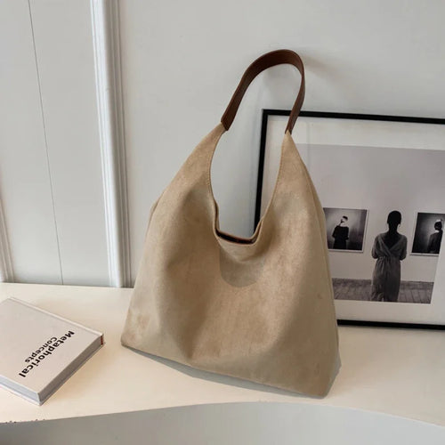Olivia – Le sac suédine élégant et intemporel