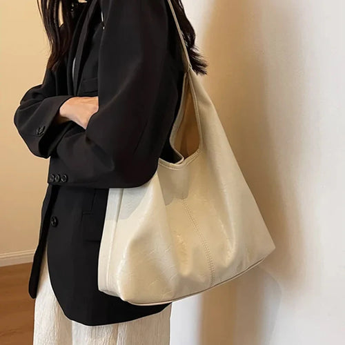 Olivia – Le sac suédine élégant et intemporel